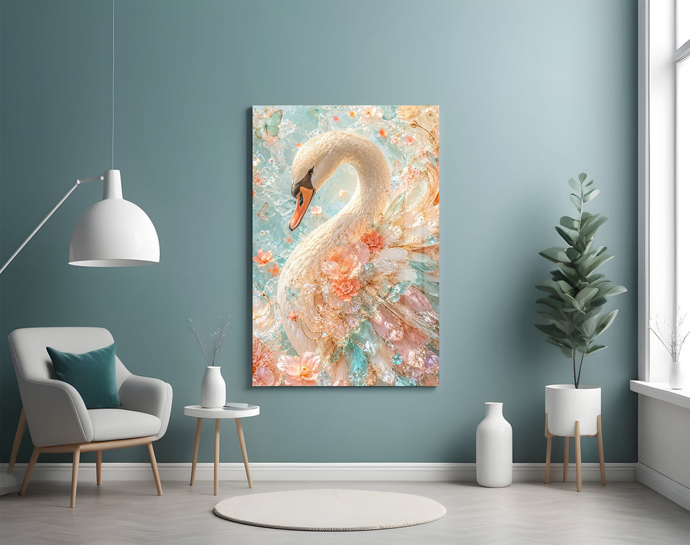 a white swan among peach and mint blossoms glass wall art styled above an armchair in a reading corner