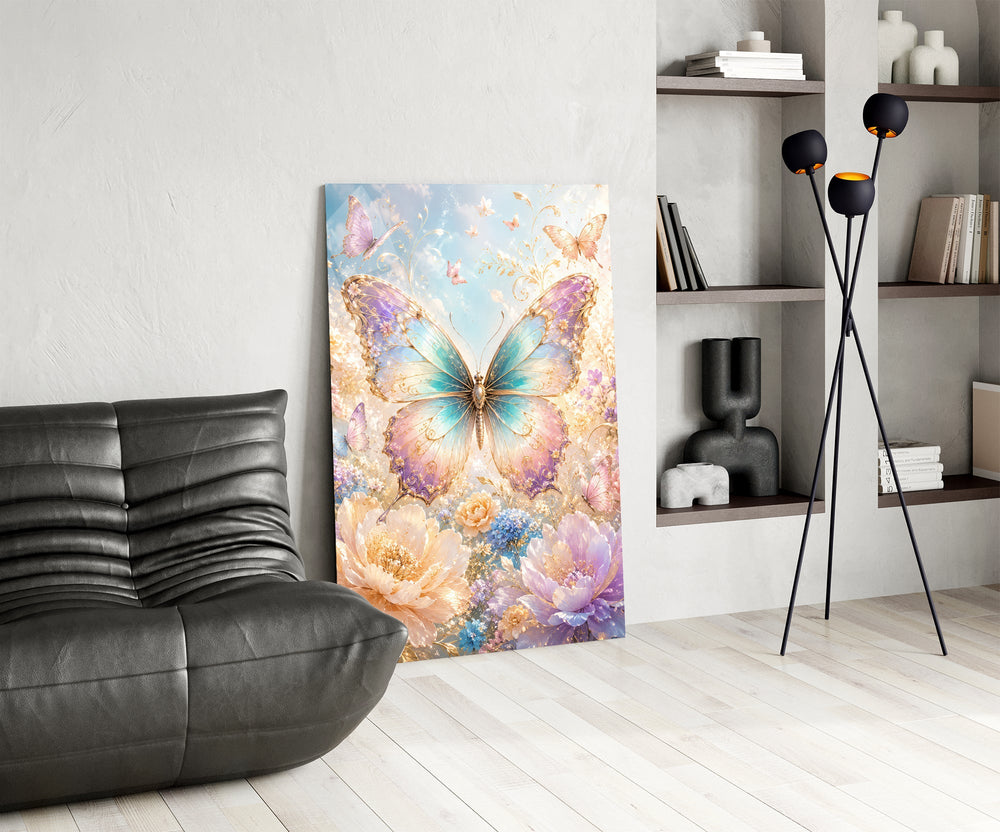 an iridescent butterfly over pastel flowers glass wall art leaning beside a dark leather sofa