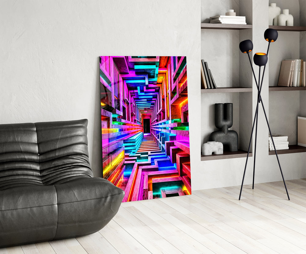 a neon rainbow corridor in deep perspective glass wall art leaning beside a dark leather sofa