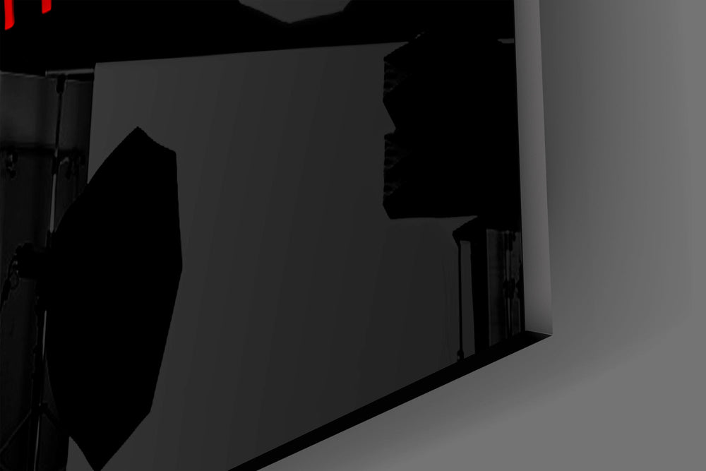 Close-up detail of the pixelated red bar filled about a quarter of the way on the glass surface