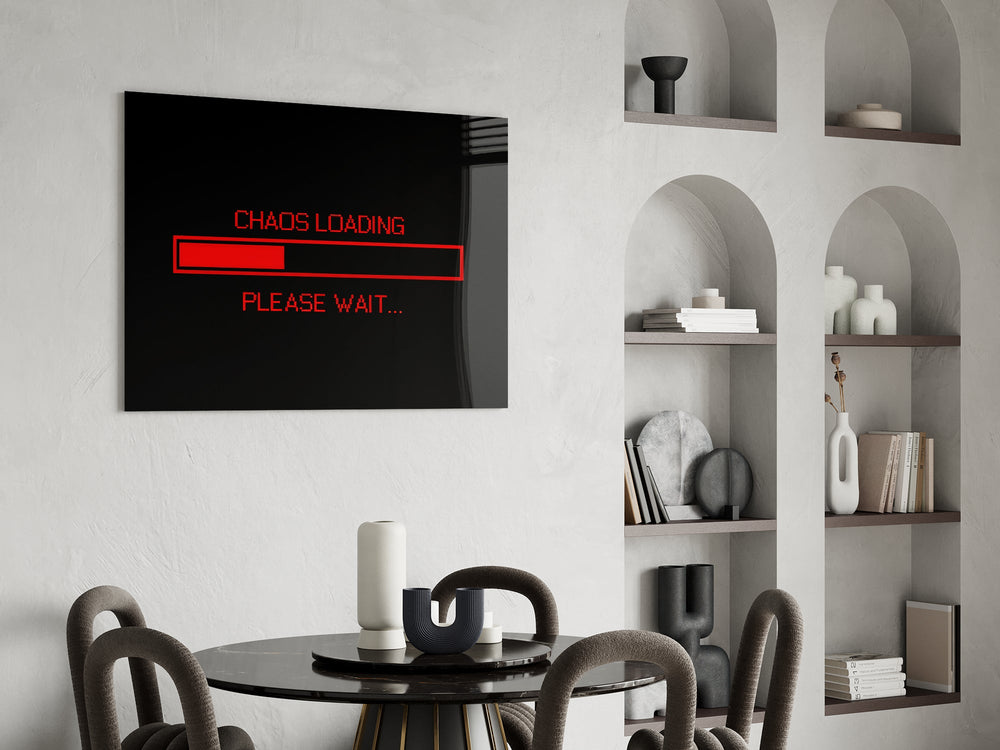 chaos loading red progress bar glass wall art leaning beside a dark leather sofa