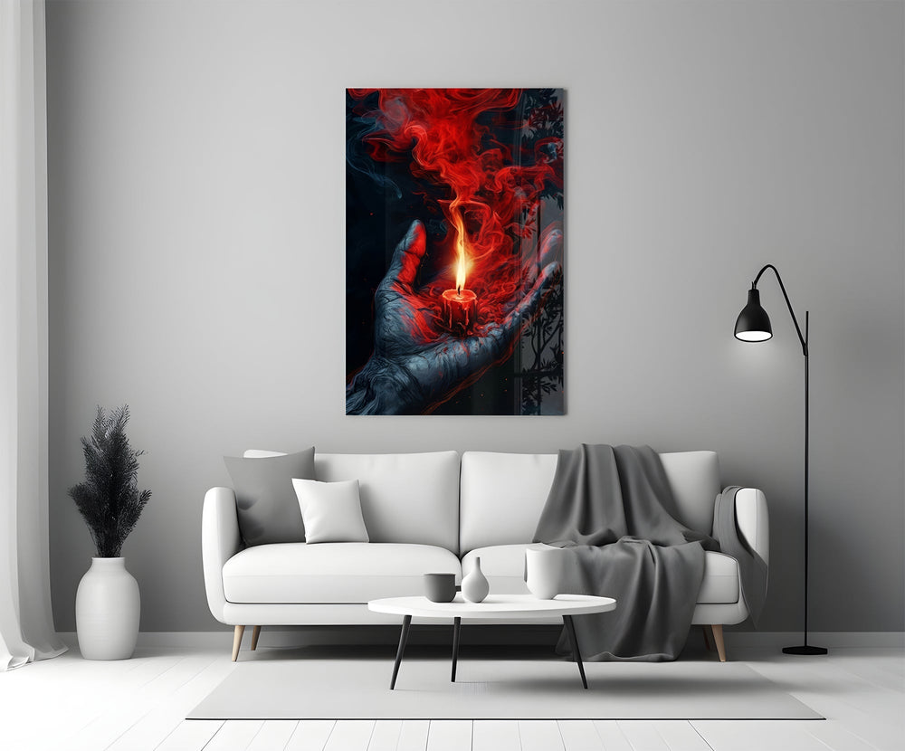 a cupped hand holding a burning red candle panel bringing character to a minimalist living room wall