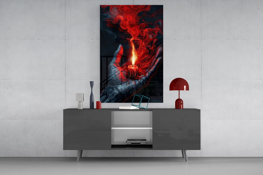 a cupped hand holding a burning red candle glass wall art displayed above a console in a designer interior