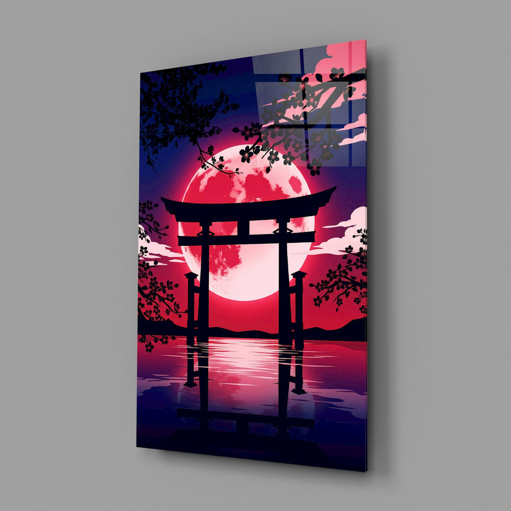a torii gate before a crimson moon glass wall art angled to show the polished tempered glass panel