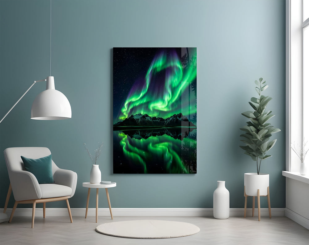 a green aurora over mirrored peaks glass wall art styled above an armchair in a reading corner