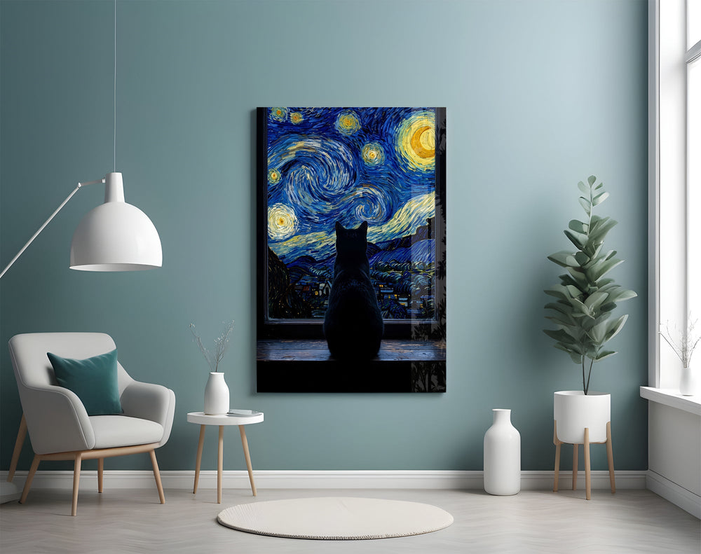 black cat at a starry night window glass wall art styled above an armchair in a reading corner