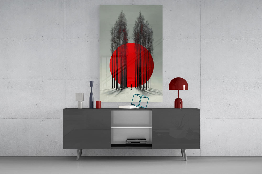 crimson sun behind bare poplars glass wall art displayed above a console in a designer interior