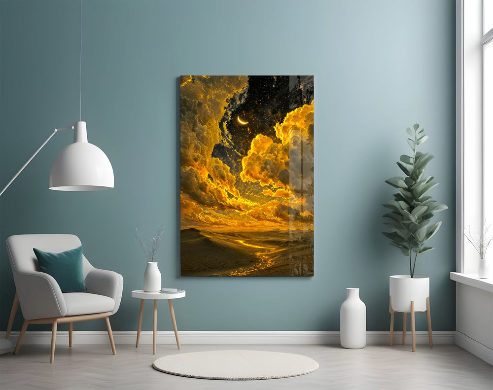 golden clouds and a crescent moon over desert dunes glass wall art styled above an armchair in a reading corner