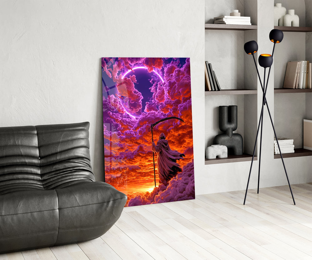 hooded reaper under a neon ring in the clouds glass wall art leaning beside a dark leather sofa