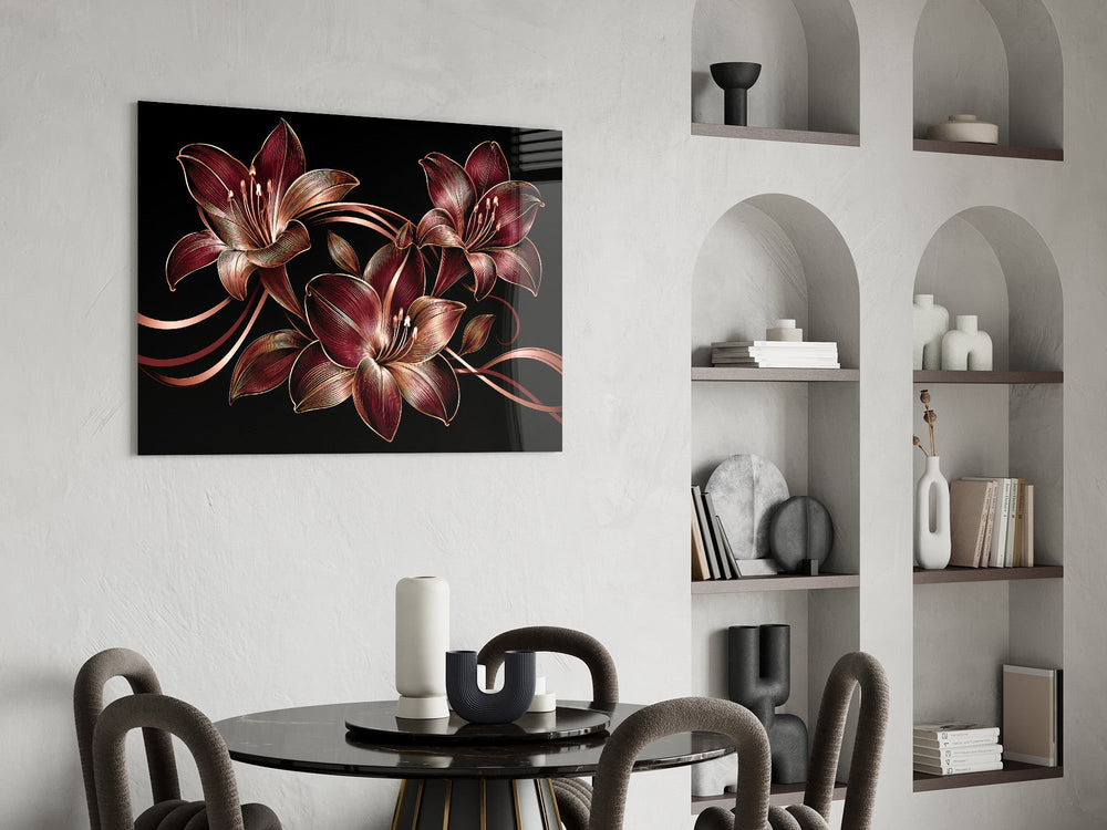 crimson and gold line-art lilies glass wall art leaning beside a dark leather sofa