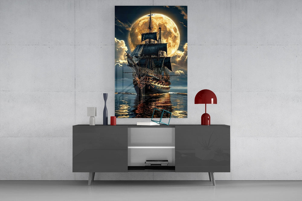 tall sailing ship before a full moon glass wall art styled in an atmospheric room setting