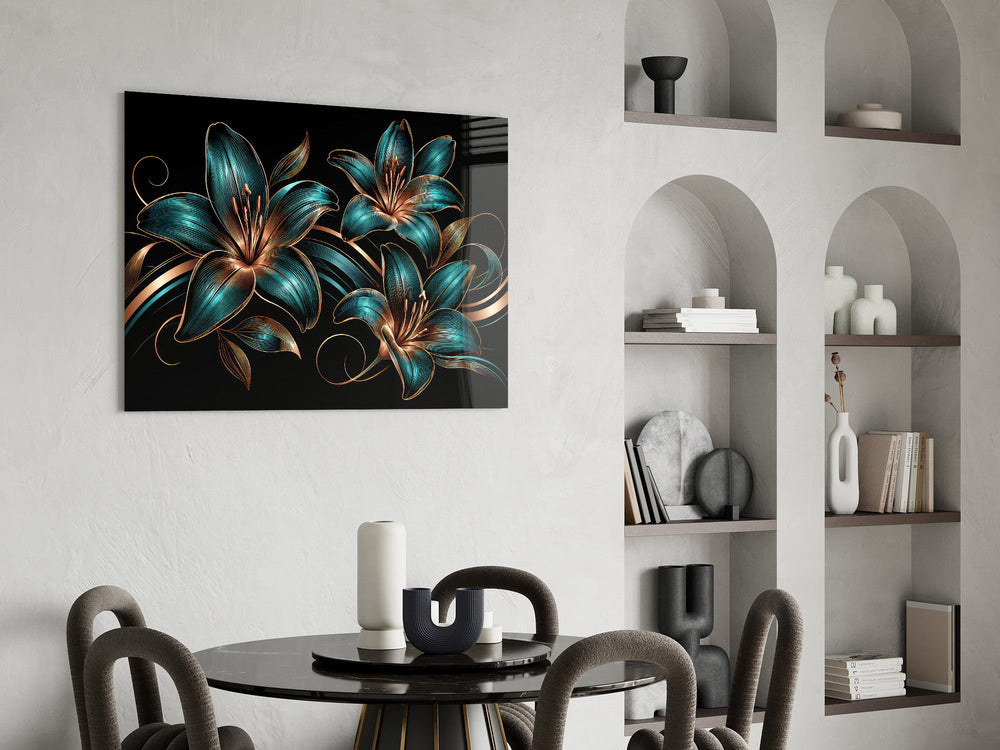 teal and copper line-art lilies glass wall art leaning beside a dark leather sofa