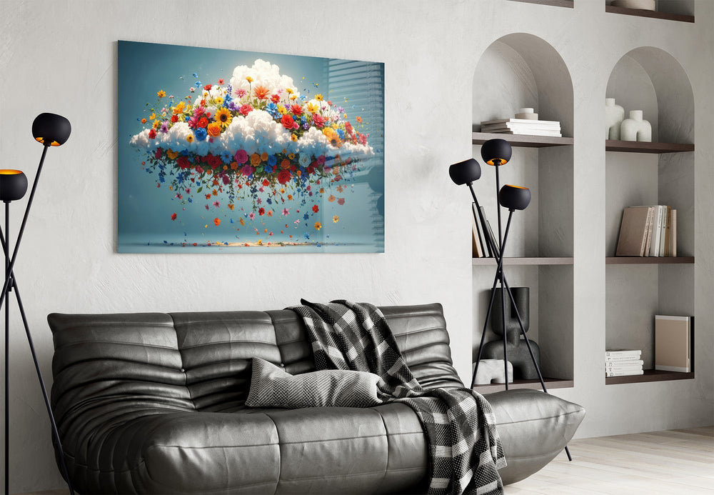 a white cloud bursting with colorful wildflowers glass wall art styled above an armchair in a reading corner