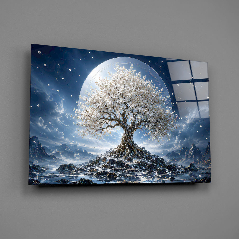 a white blossom tree beneath a full moon glass wall art angled to show the polished tempered glass panel