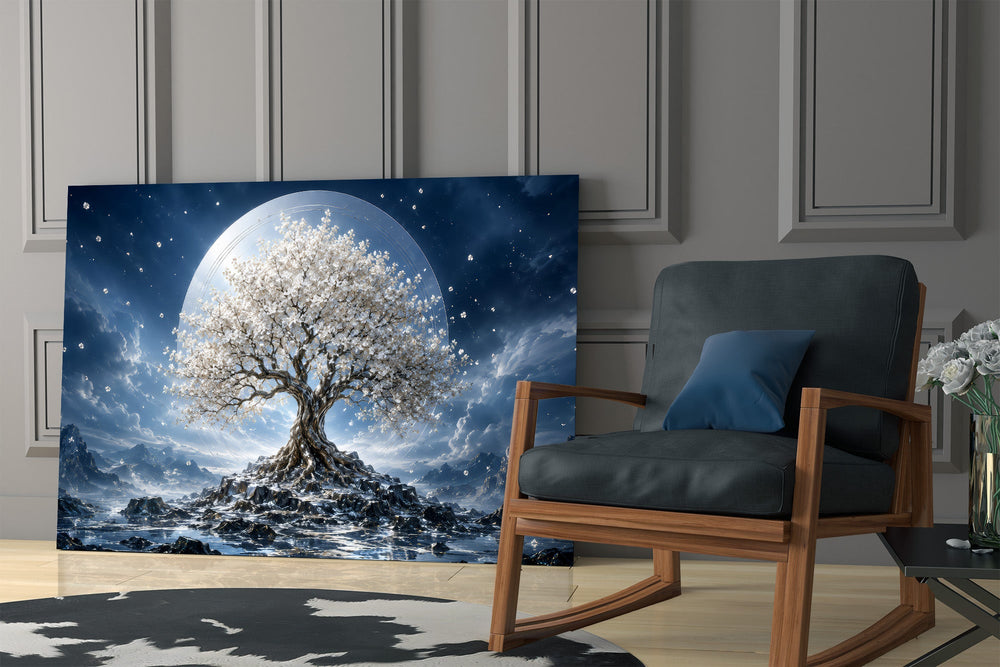 a white blossom tree beneath a full moon panel resting in a shelving niche in a modern interior