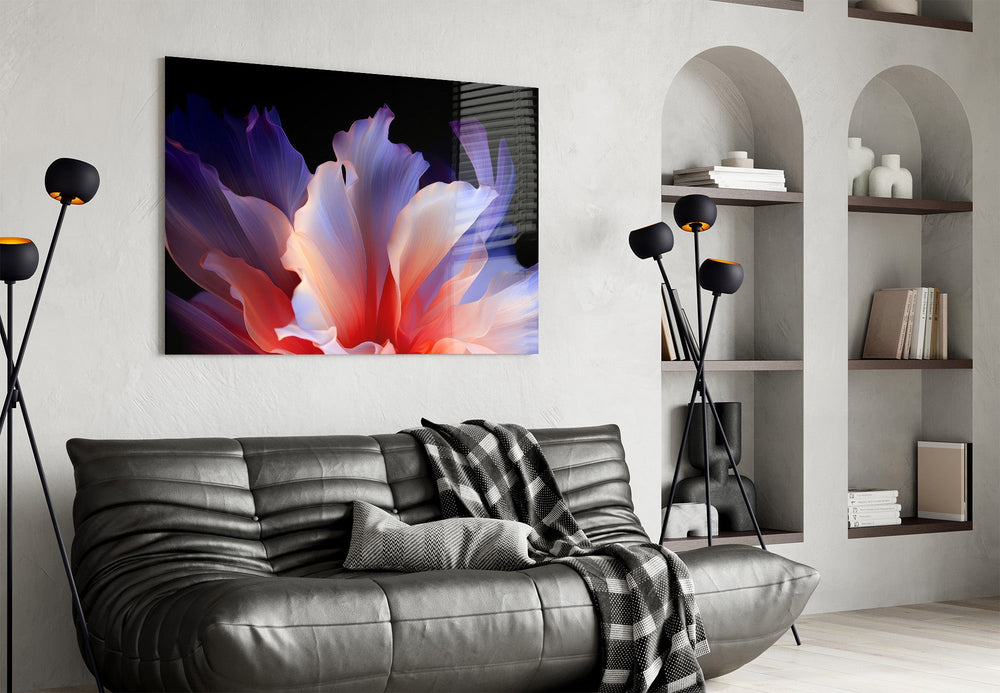 an abstract flower with translucent petals glass wall art styled above an armchair in a reading corner