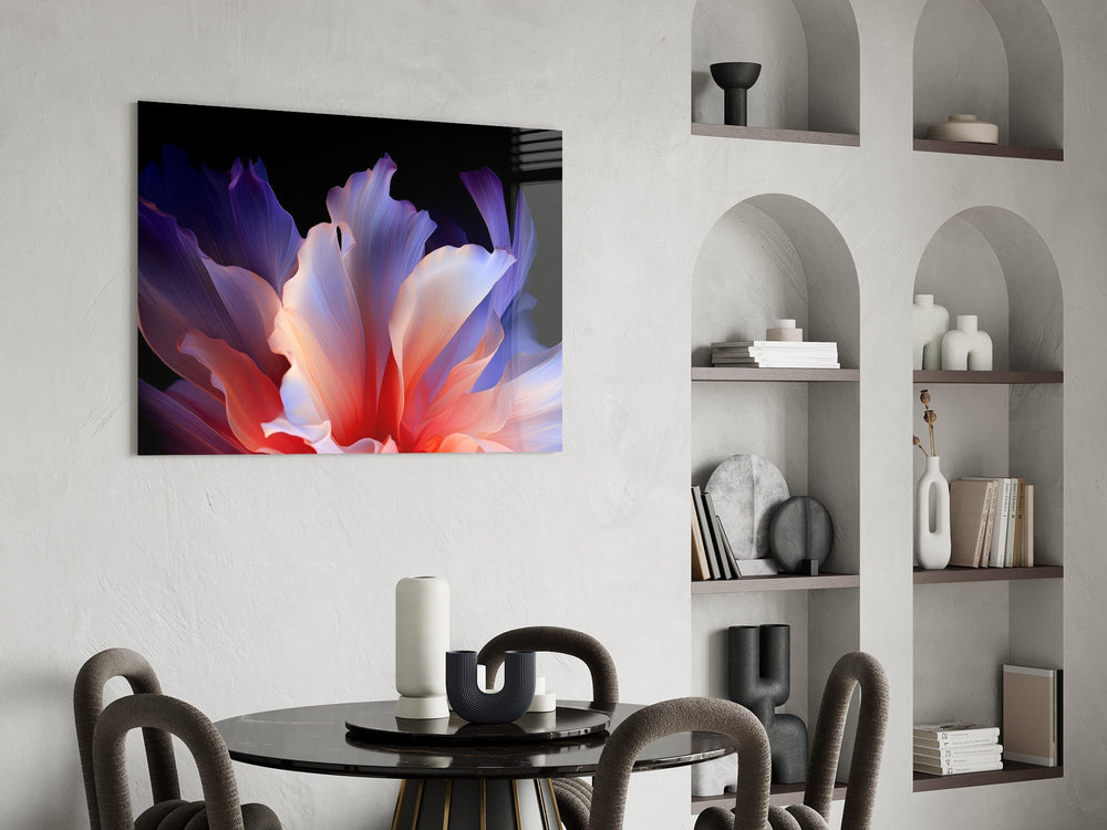 an abstract flower with translucent petals glass wall art leaning beside a dark leather sofa