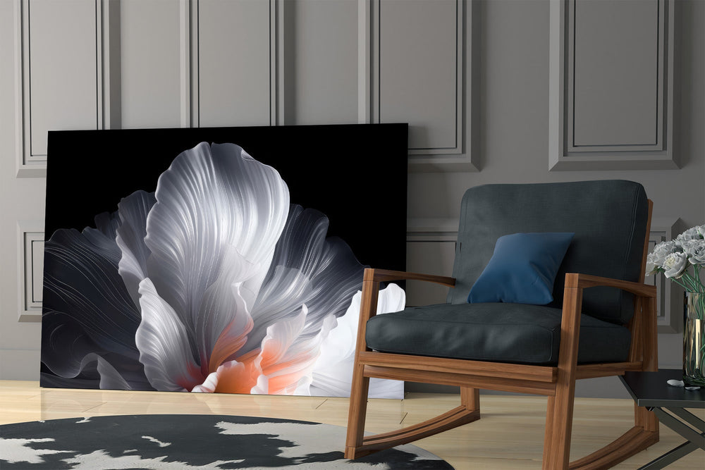 an abstract white flower on black panel resting in a shelving niche in a modern interior