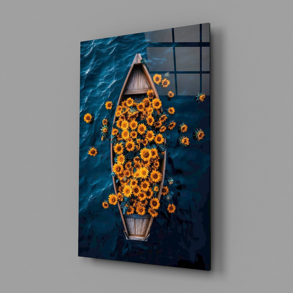 a wooden rowboat full of sunflowers on dark water glass wall art angled to show the polished tempered glass panel