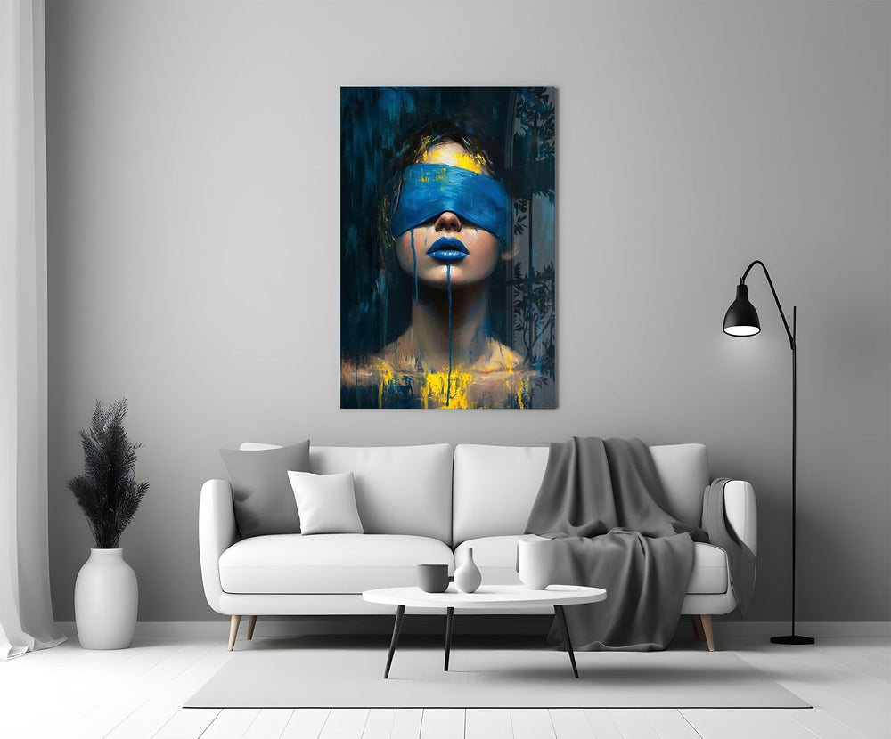 a blindfolded woman with blue lips and dripping paint panel bringing character to a minimalist living room wall