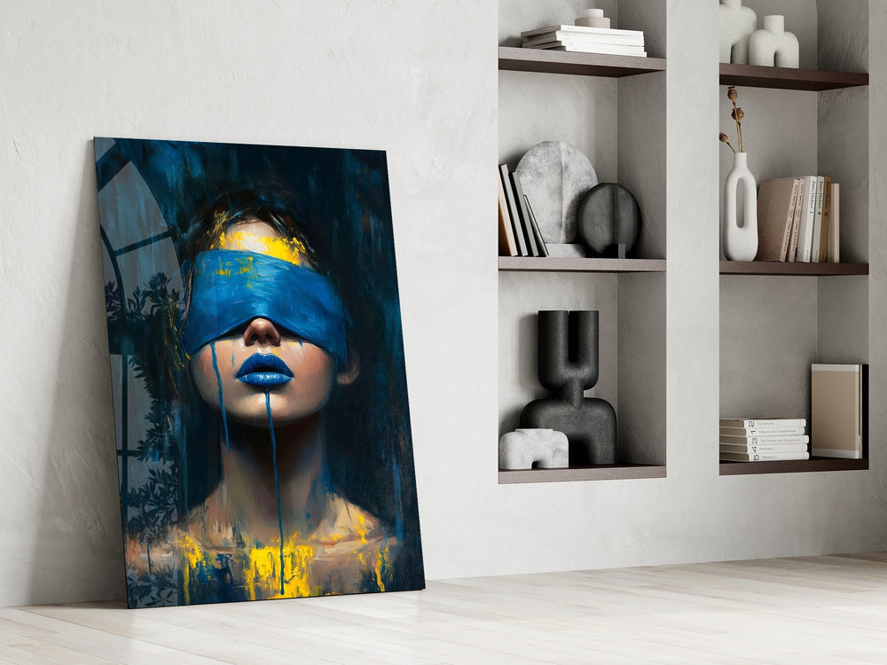 a blindfolded woman with blue lips and dripping paint panel resting in a shelving niche in a modern interior