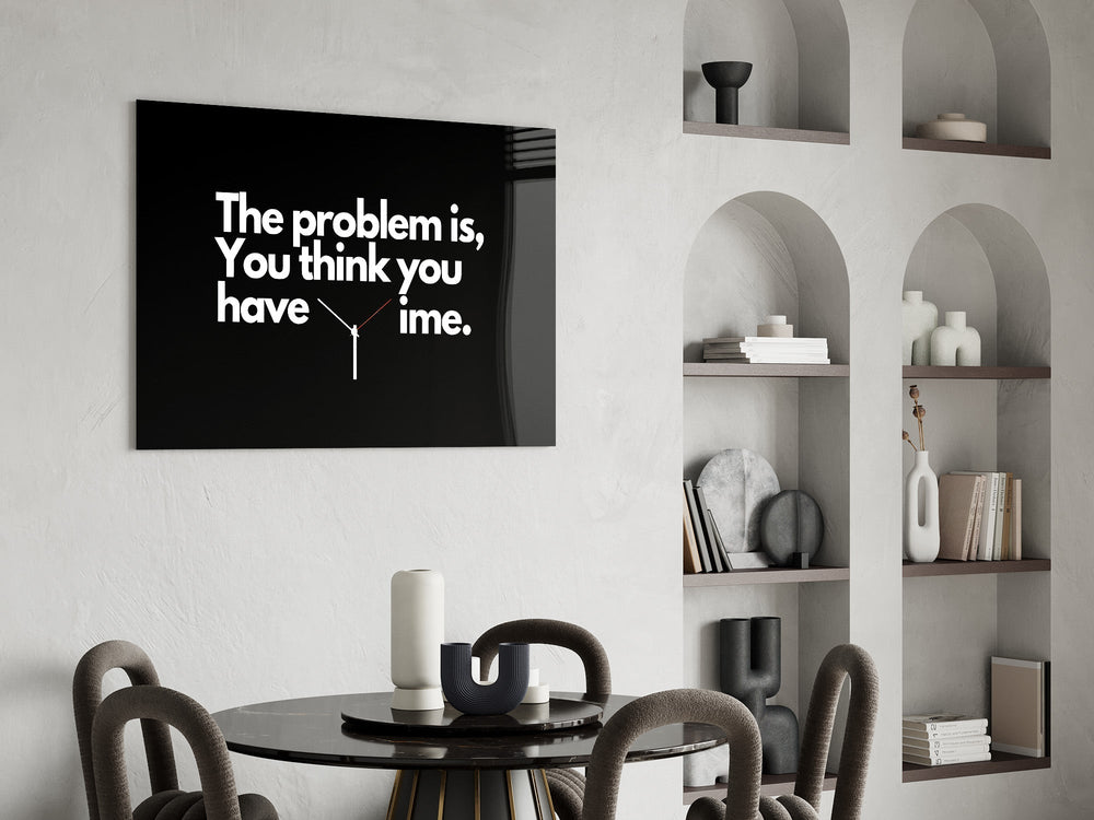 you think you have time clock quote glass wall art leaning beside a dark leather sofa