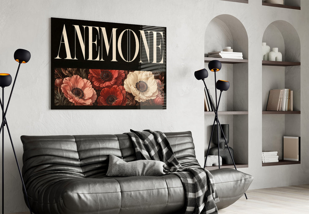 anemone bloom typography glass wall art styled above an armchair in a reading corner