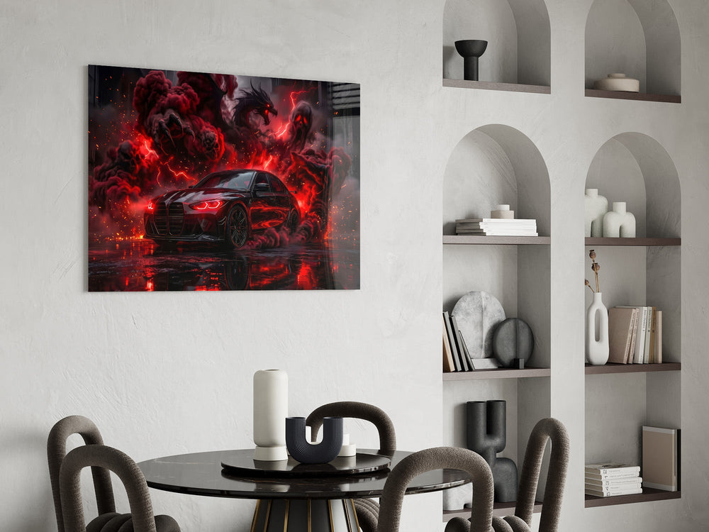 black performance sedan in red smoke glass wall art leaning beside a dark leather sofa
