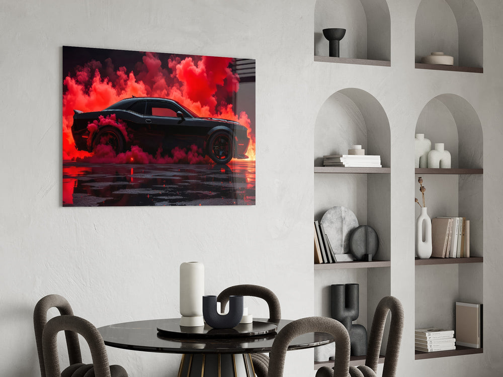 black muscle car in crimson smoke glass wall art leaning beside a dark leather sofa