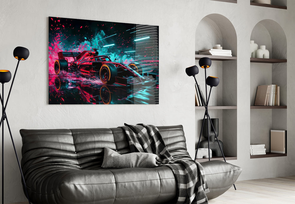 red open-wheel race car with cyan light streaks glass wall art styled above an armchair in a reading corner