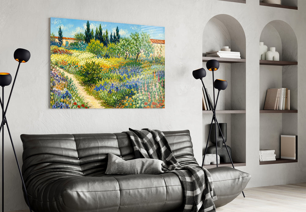 impressionist flower garden with a path glass wall art styled above an armchair in a reading corner