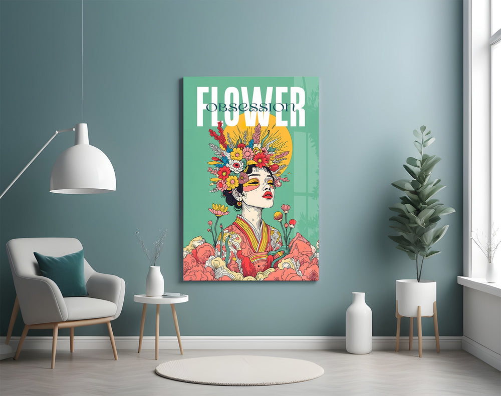 a woman crowned with wildflowers glass wall art styled above an armchair in a reading corner