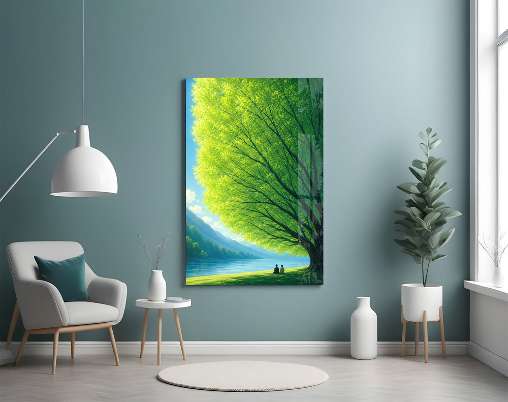 two friends beneath a sprawling tree glass wall art styled above an armchair in a reading corner