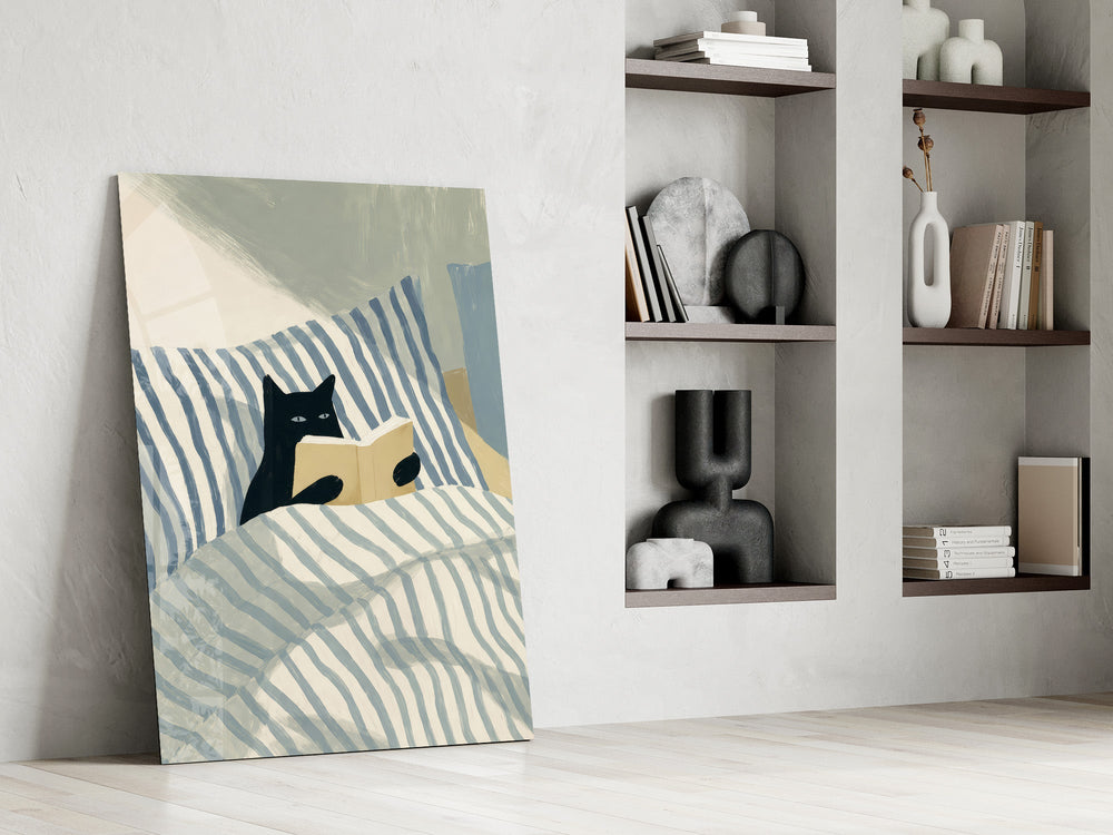 black cat reading in striped bedding panel resting in a shelving niche in a modern interior