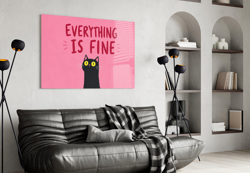 startled black cat on hot pink glass wall art styled above an armchair in a reading corner