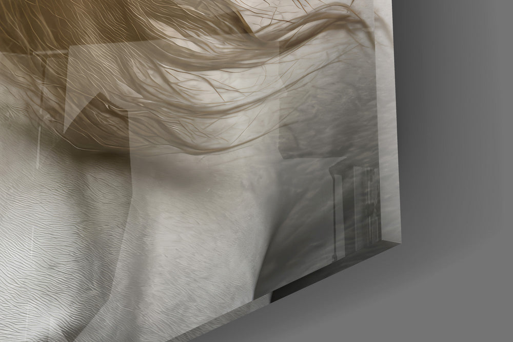 Close-up detail of the long pale mane falling across the face and the dark eye on the glass surface