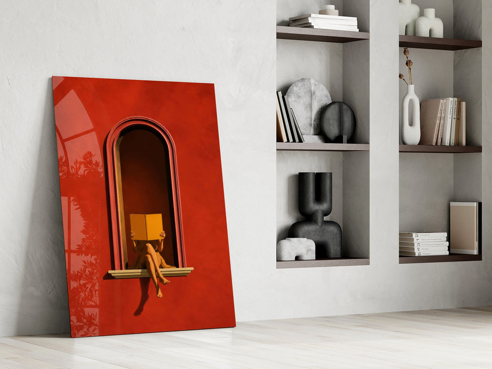figure reading in a red arched niche panel resting in a shelving niche in a modern interior
