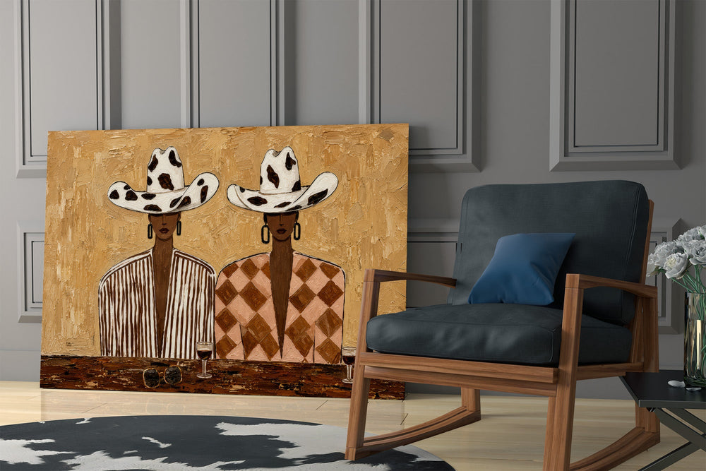 two women in cow-print cowboy hats panel resting in a shelving niche in a modern interior
