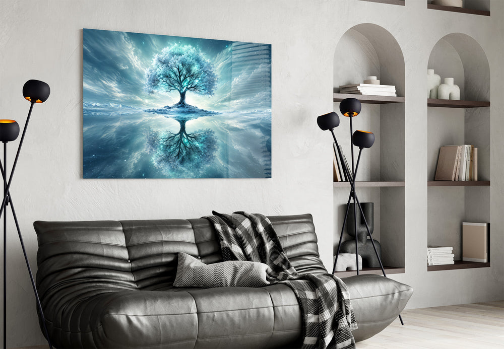 frozen turquoise tree in a winter landscape glass wall art styled above an armchair in a reading corner