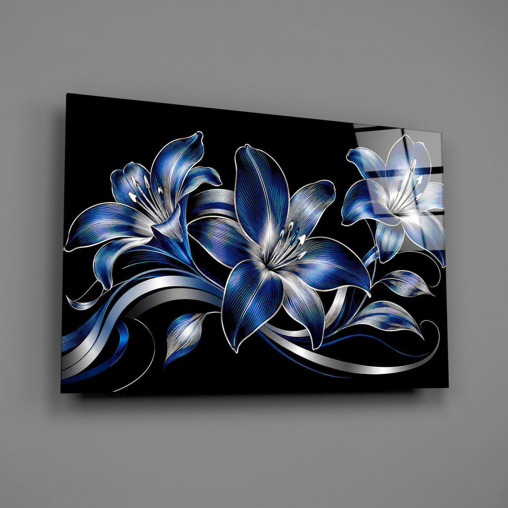 sapphire blue and silver lilies on black glass wall art angled to show the polished tempered glass panel