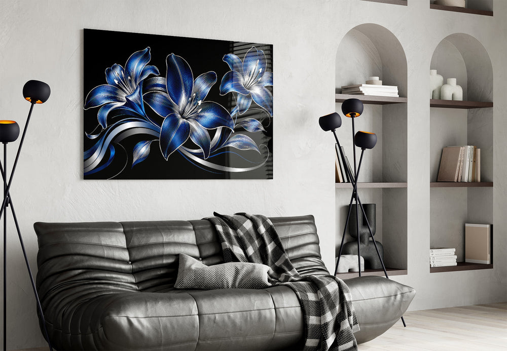 sapphire blue and silver lilies on black glass wall art styled above an armchair in a reading corner
