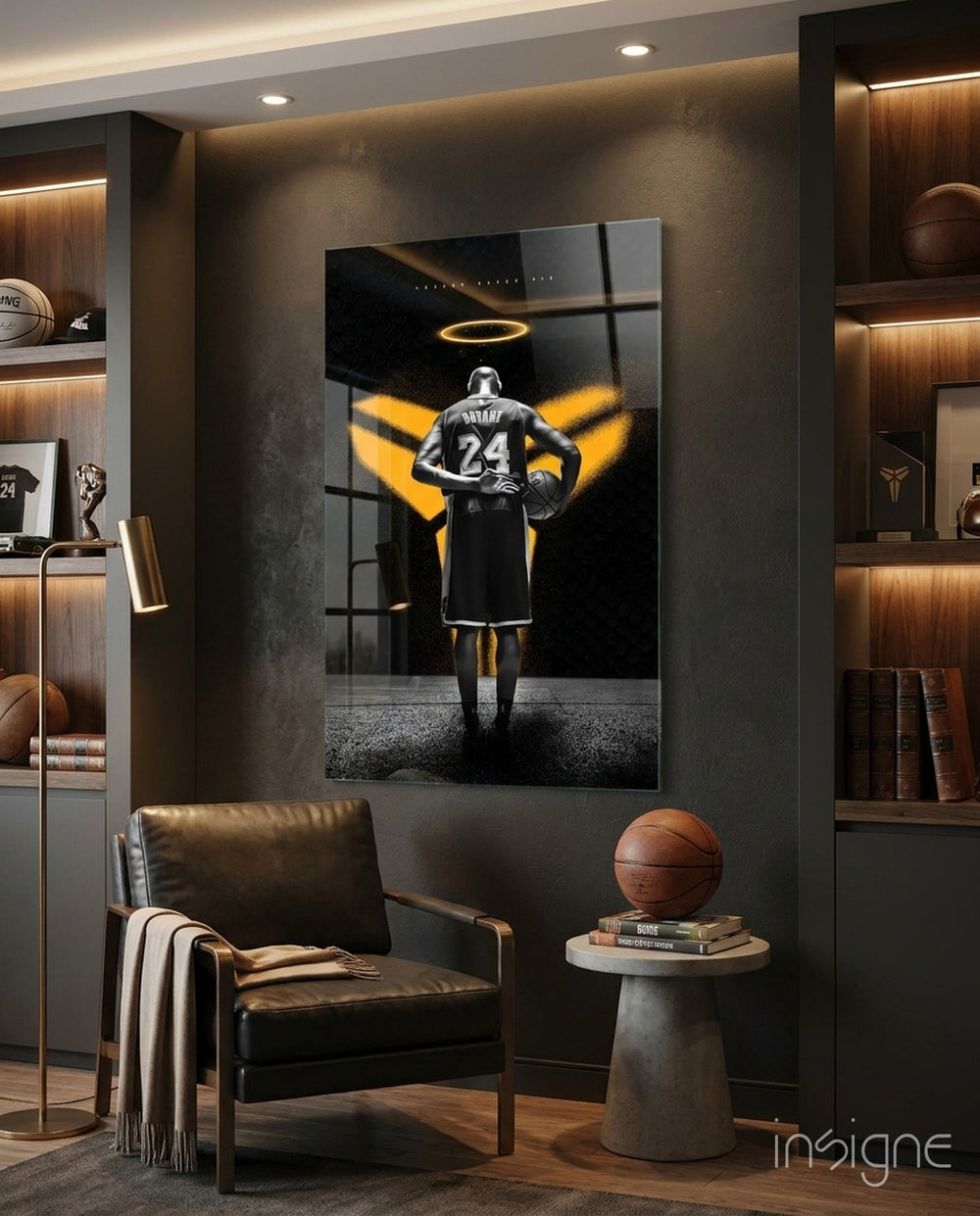 Kobe Bryant glass wall art displayed above a leather chair in a man cave