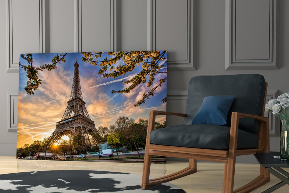 Eiffel Tower artwork above a dining table adding a classic travel mood