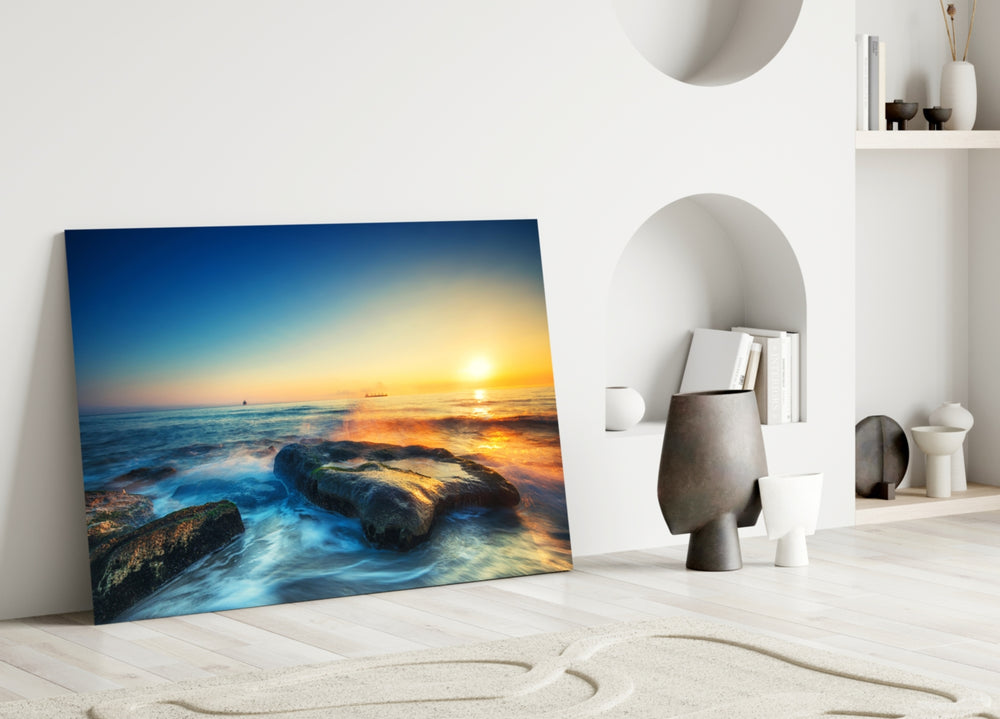 Sea View glass wall art styled above a sofa in a serene living room