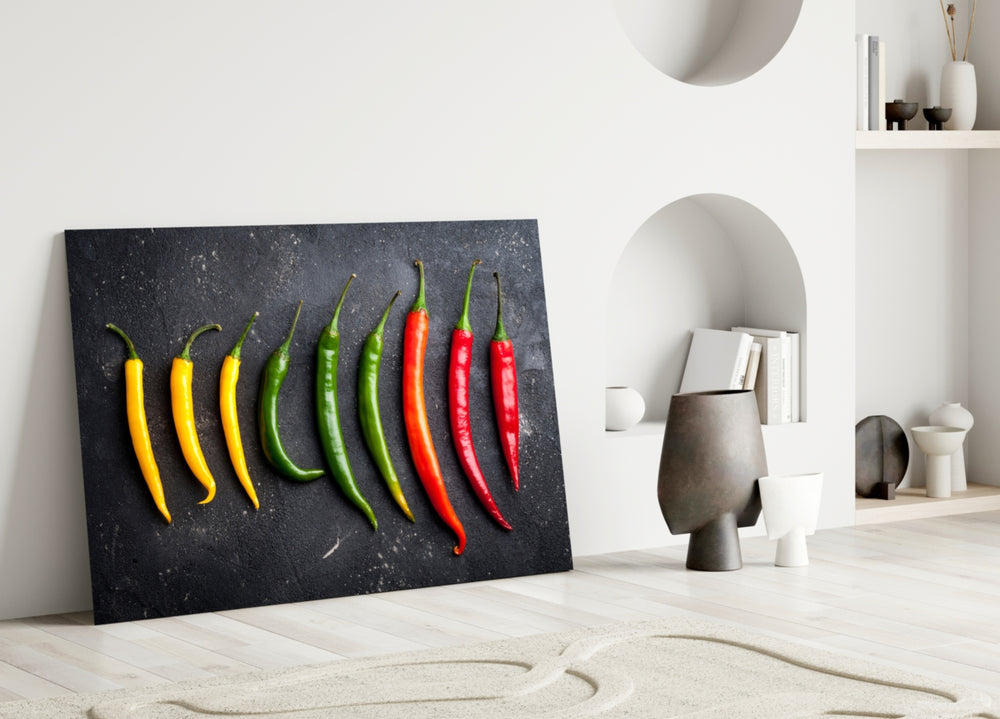 Pepper glass wall art styled above a kitchen counter in a modern home
