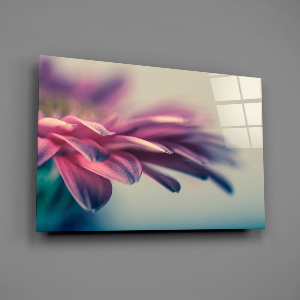 Close-up detail of the pink gerbera petals against cream bokeh