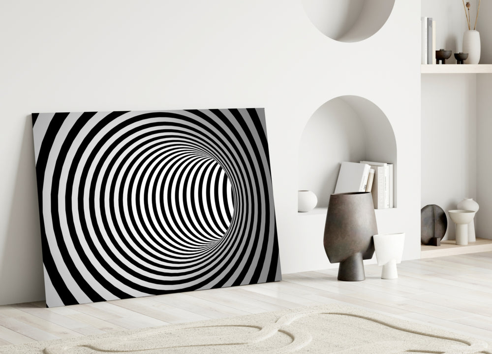 Illusion glass wall art styled above a sofa in a modern, minimalist living room