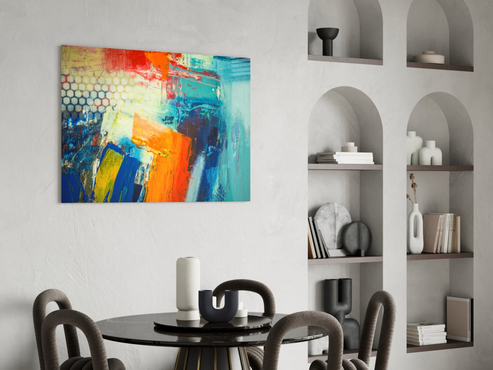 Abstract glass print enhancing a dining area with painterly energy