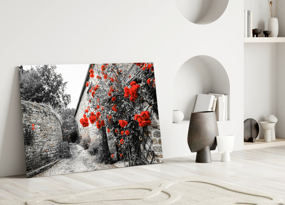 Red Rose glass wall art styled above a bed in a romantic bedroom