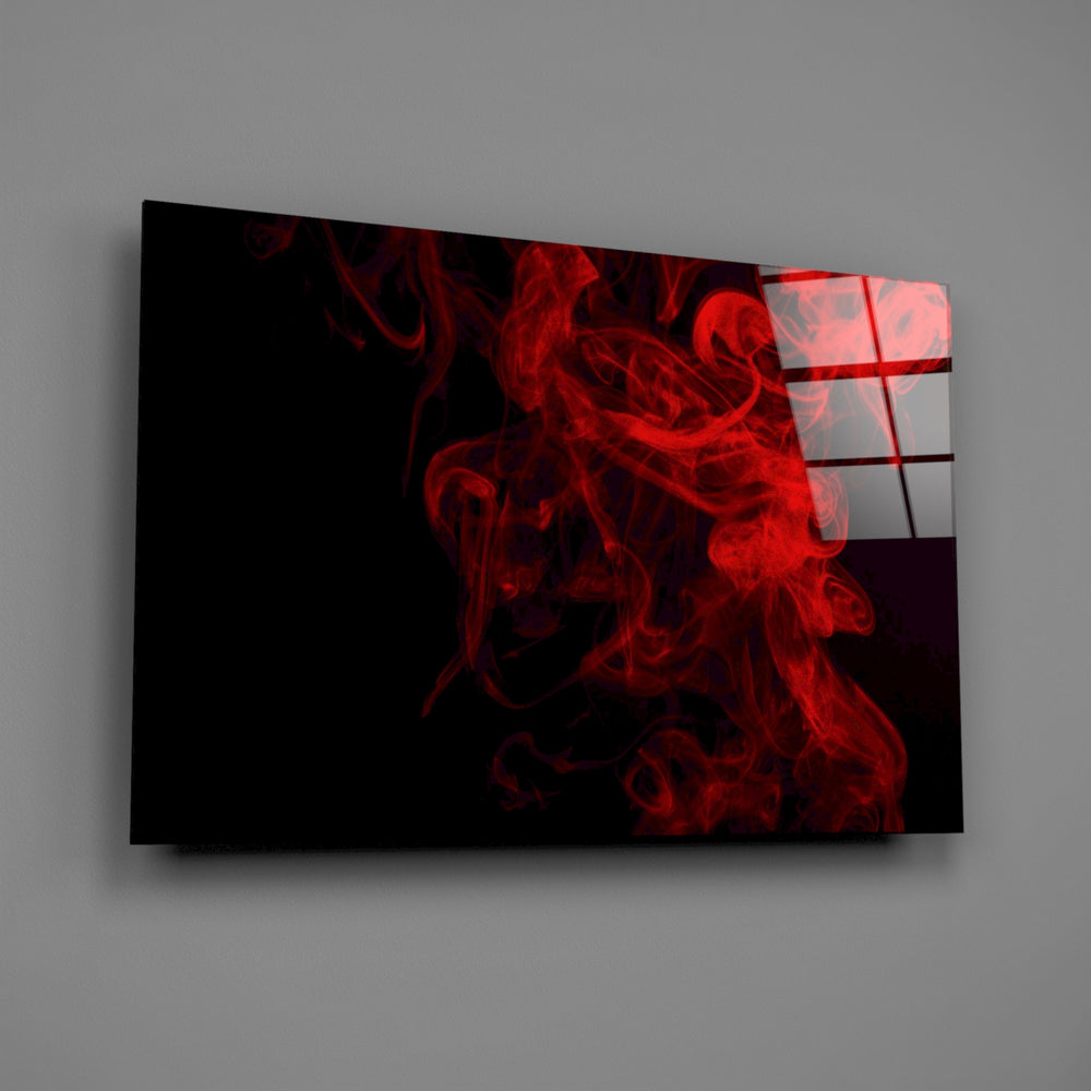 Close-up detail of the red smoke tendrils against a pure black ground